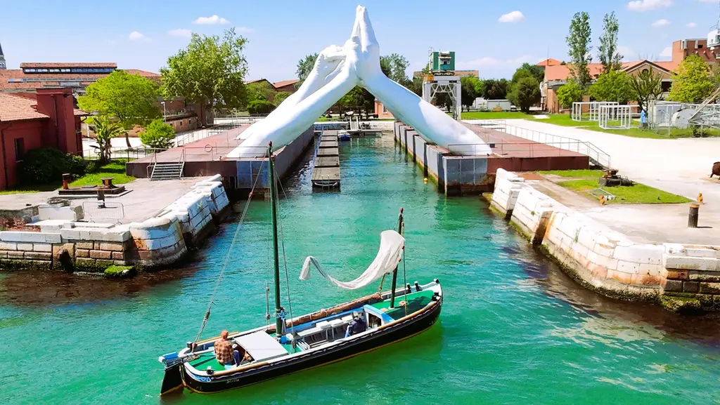 Building Bridges Sculpture by Lorenzo Quinn with Stella from high above