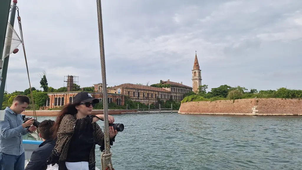 View of Poveglia Island from Stella, a 1965 Bragozzo, on a tour of the southern lagoon.